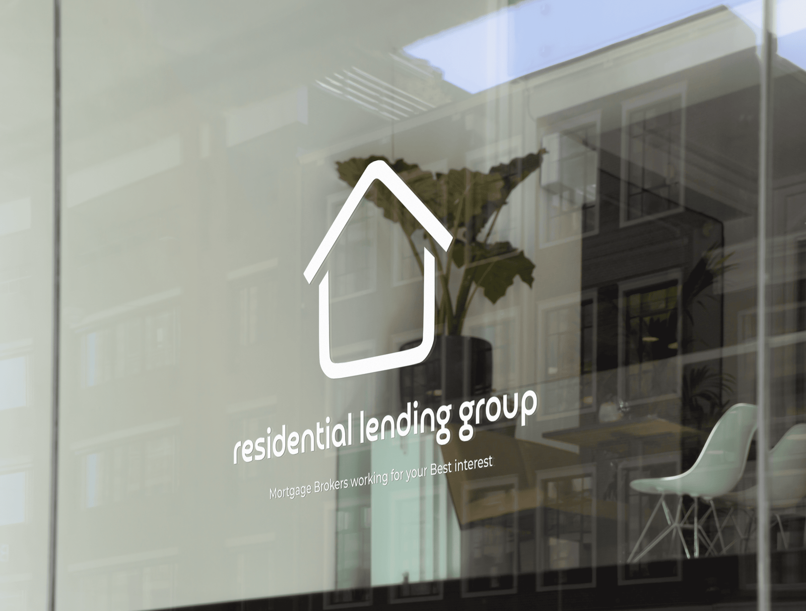 resilend logo sticker on window of office