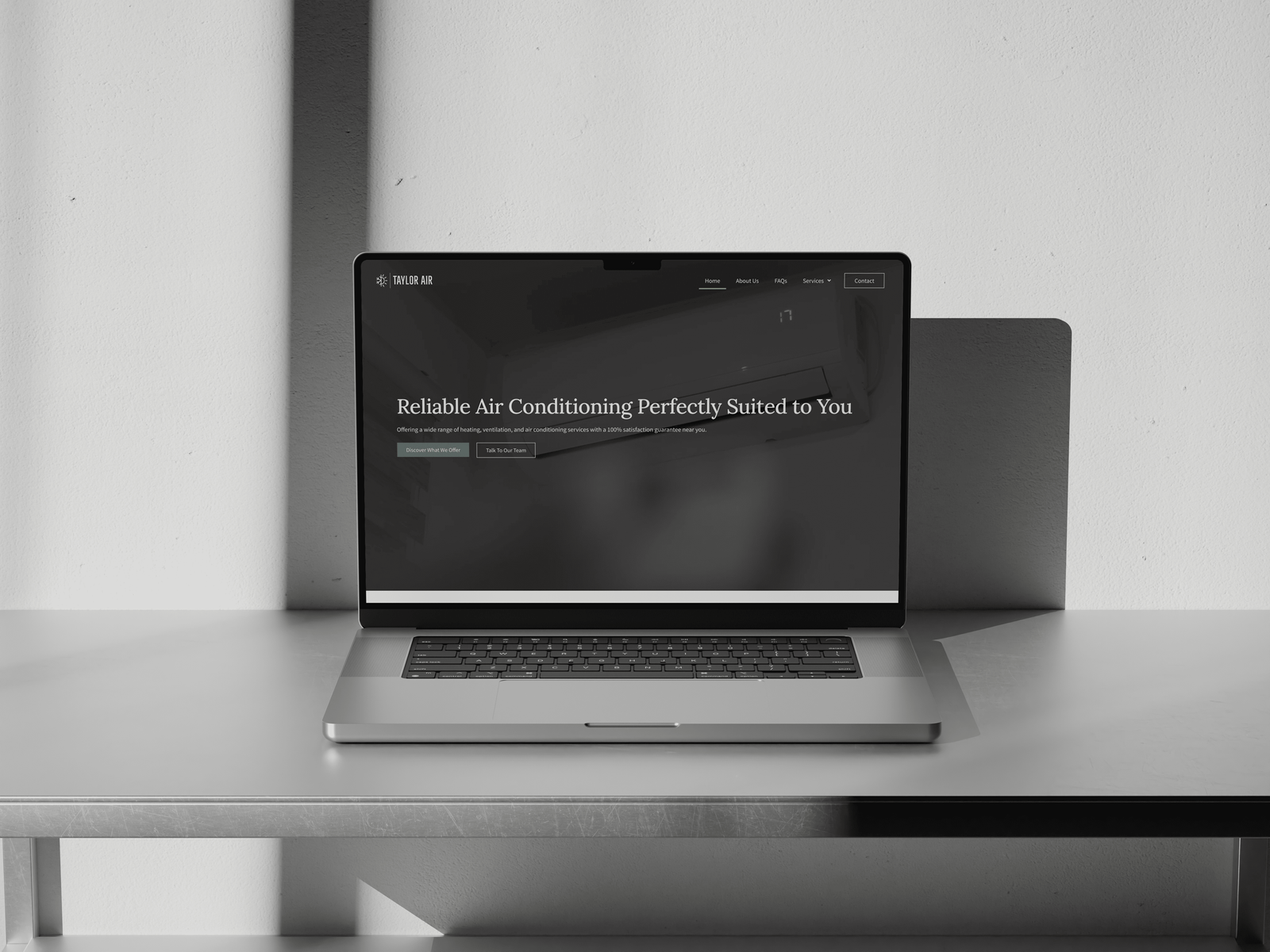 laptop on desk with taylor air website